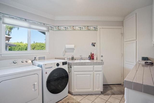 1524 Zutano Ln, Fallbrook, CA 92028 - laundry area with washer and dryer, light tile patterned floors, crown molding, and cabinet space