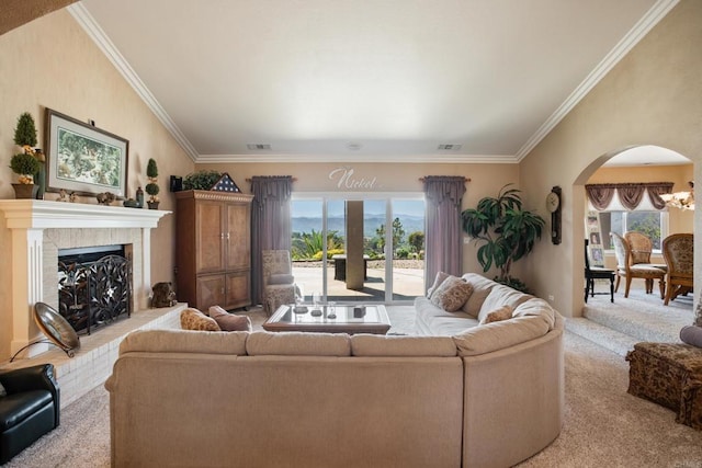 1524 Zutano Ln, Fallbrook, CA 92028 - carpeted living room featuring arched walkways, ornamental molding, and a fireplace with raised hearth