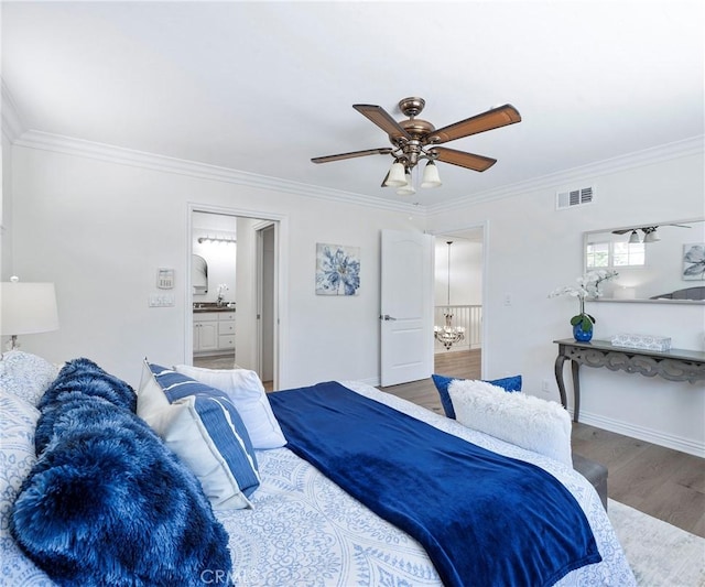 415 Buttonwood Dr, Brea, CA 92821 - bedroom with crown molding, wood finished floors, a ceiling fan, and connected bathroom