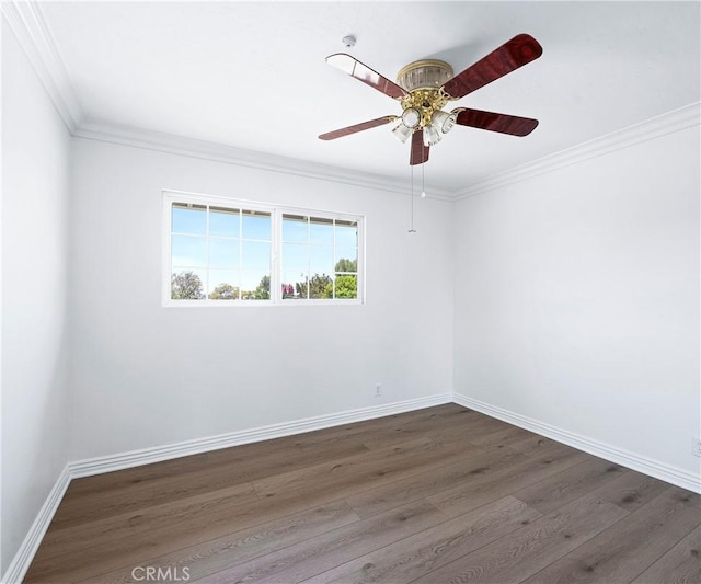 415 Buttonwood Dr, Brea, CA 92821 - empty room featuring dark wood-type flooring, crown molding, and ceiling fan