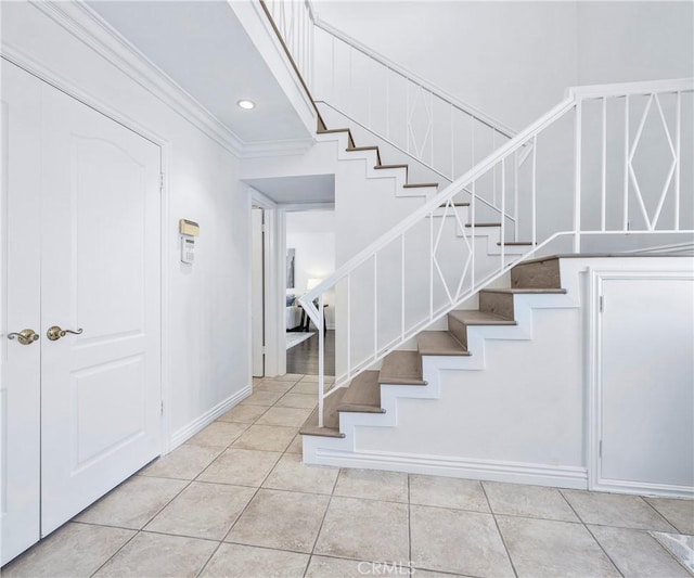 415 Buttonwood Dr, Brea, CA 92821 - stairway with ornamental molding, tile patterned floors, and recessed lighting