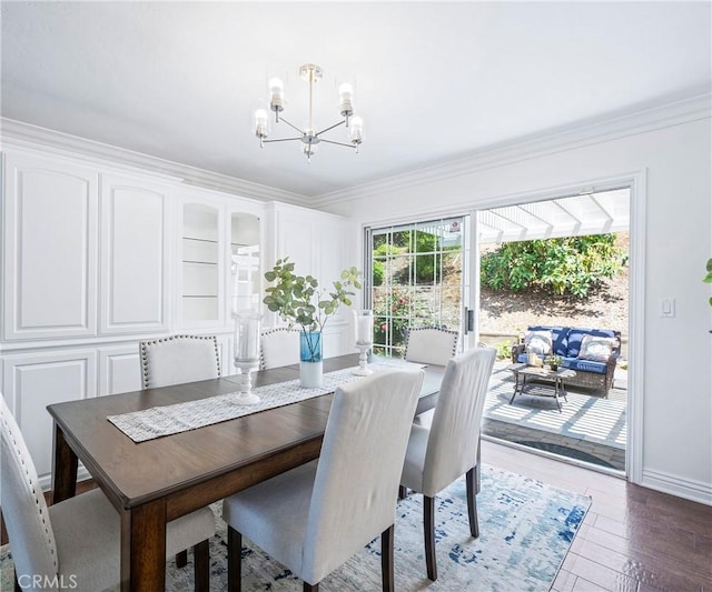 415 Buttonwood Dr, Brea, CA 92821 - dining area with a chandelier, crown molding, and wood finished floors