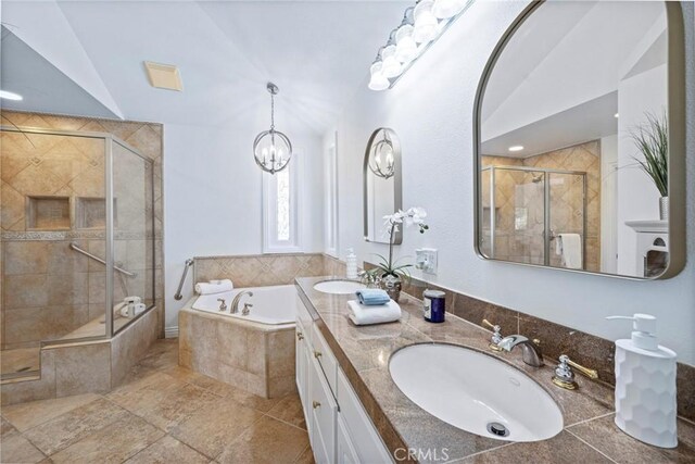 415 Buttonwood Dr, Brea, CA 92821 - full bath with a bath, a stall shower, double vanity, a chandelier, and vaulted ceiling