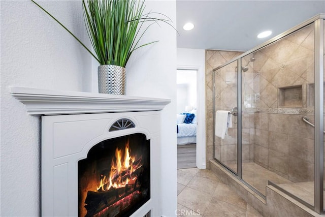 415 Buttonwood Dr, Brea, CA 92821 - ensuite bathroom featuring a stall shower, tile patterned floors, a lit fireplace, and recessed lighting