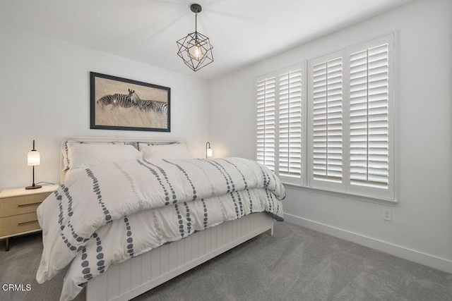 1437 Windshore Way, Oxnard, CA 93035 - carpeted bedroom with baseboards and a chandelier