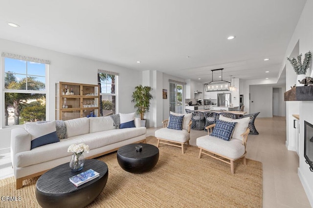 1437 Windshore Way, Oxnard, CA 93035 - living room with recessed lighting and a glass covered fireplace
