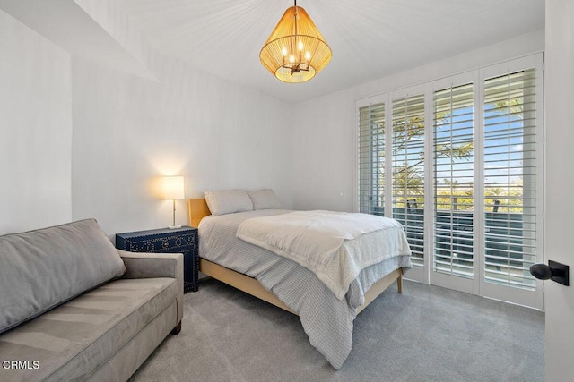 1437 Windshore Way, Oxnard, CA 93035 - bedroom with a chandelier, access to outside, and carpet flooring