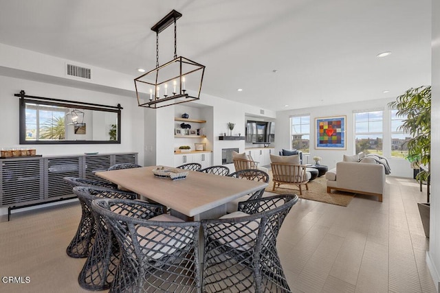 1437 Windshore Way, Oxnard, CA 93035 - dining area with a chandelier and recessed lighting