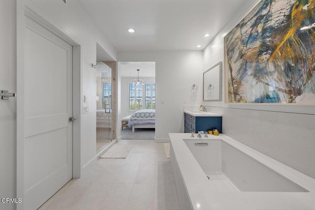 1437 Windshore Way, Oxnard, CA 93035 - full bath with vanity, recessed lighting, a bath, ensuite bath, and a chandelier