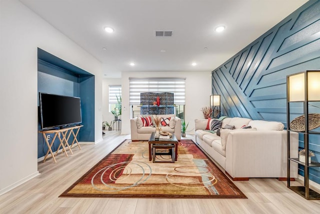 5261 Beachfront Cove St # 174, San Diego, CA 92154 - living room with wood finished floors and recessed lighting