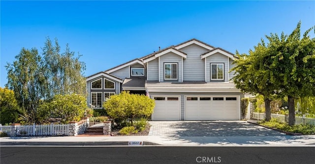 3602 E Ridgeway Rd, Orange, CA 92867 - view of front of home with a garage and concrete driveway