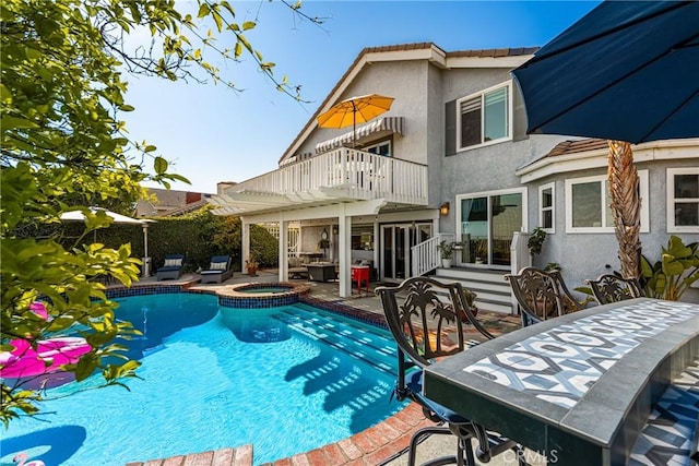 3602 E Ridgeway Rd, Orange, CA 92867 - view of pool featuring a patio, a pool with connected hot tub, and outdoor dining area
