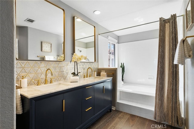 29416 Port Royal Way, Laguna Niguel, CA 92677 - full bathroom featuring wood finished floors, backsplash, double vanity, and recessed lighting