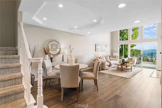 29416 Port Royal Way, Laguna Niguel, CA 92677 - dining space featuring stairs, a raised ceiling, wood finished floors, and recessed lighting
