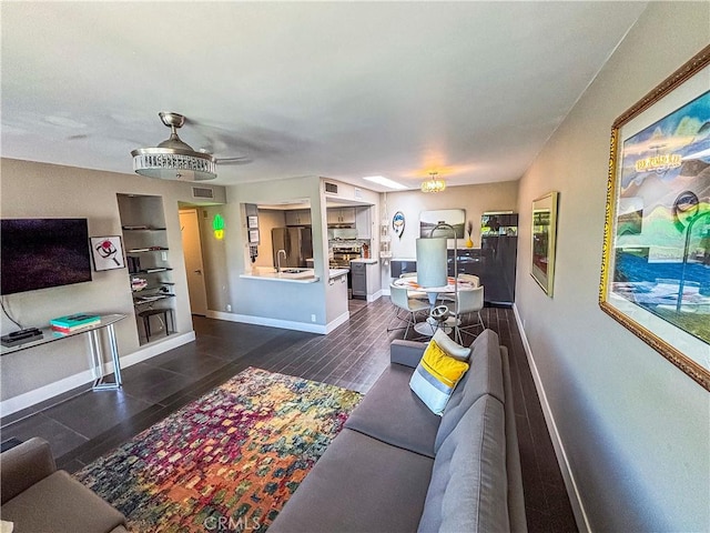 1111 E Ramon Rd Unit 37, Palm Springs, CA 92264 - living room with baseboards