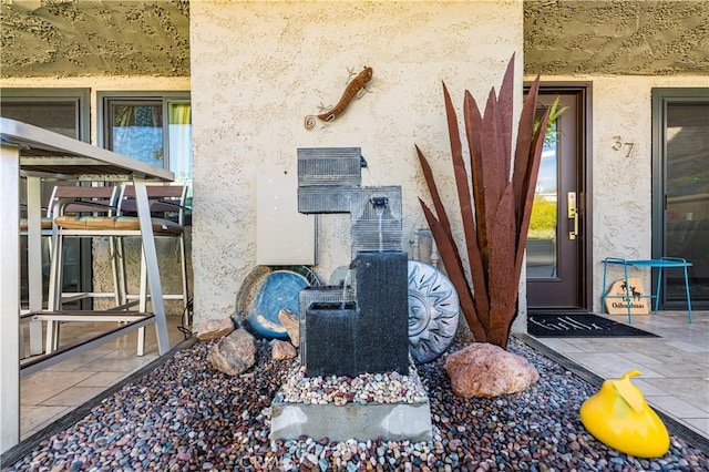 1111 E Ramon Rd Unit 37, Palm Springs, CA 92264 - property entrance with stucco siding