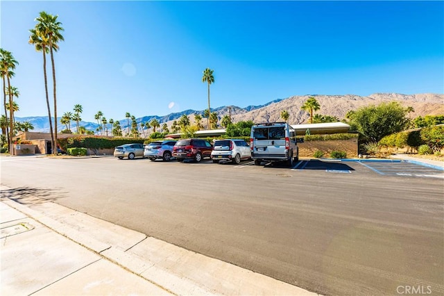 1111 E Ramon Rd Unit 37, Palm Springs, CA 92264 - uncovered parking lot featuring a mountain view