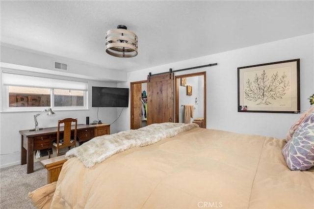 1164 12th St, Los Osos, CA 93402 - carpeted bedroom featuring a barn door