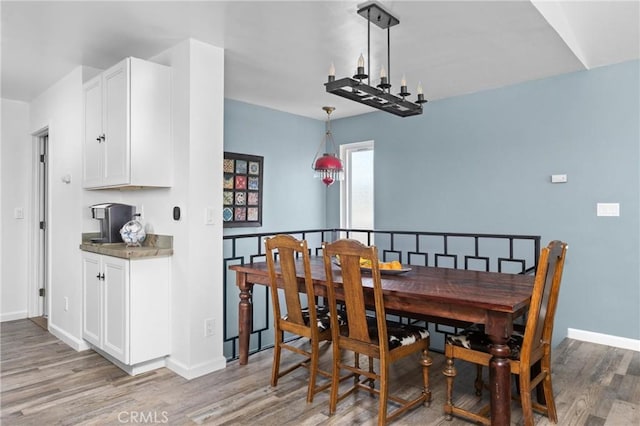 1164 12th St, Los Osos, CA 93402 - dining space with light wood-style flooring and baseboards