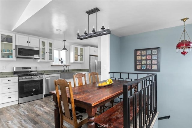 1164 12th St, Los Osos, CA 93402 - dining area with wood finished floors and recessed lighting