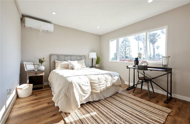 10113 Dorset, Rancho Cucamonga, CA 91730 - bedroom featuring a wall mounted air conditioner, wood finished floors, and recessed lighting