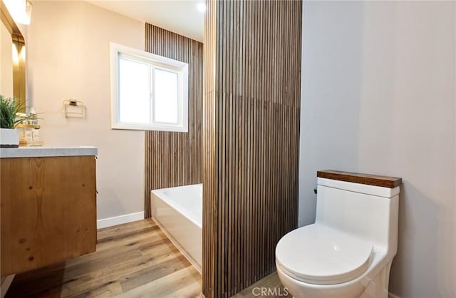10113 Dorset, Rancho Cucamonga, CA 91730 - bathroom featuring vanity, wood finished floors, and  shower combination
