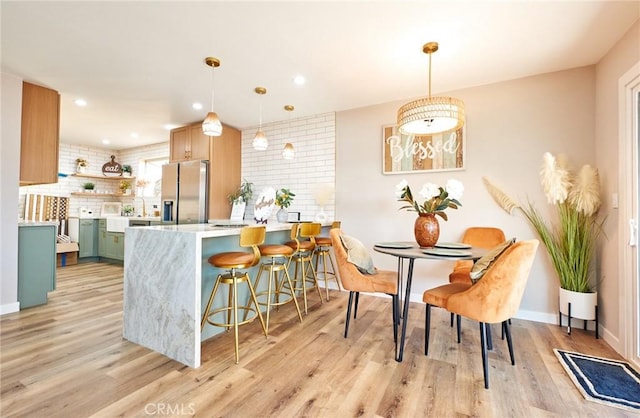 10113 Dorset, Rancho Cucamonga, CA 91730 - dining room with light wood-style floors and recessed lighting
