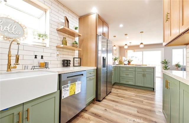 10113 Dorset, Rancho Cucamonga, CA 91730 - kitchen with green cabinetry, appliances with stainless steel finishes, tasteful backsplash, light wood-style floors, and recessed lighting