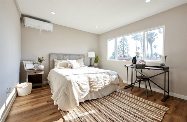 10113 Dorset, Rancho Cucamonga, CA 91730 - bedroom with a wall mounted air conditioner, wood finished floors, and recessed lighting