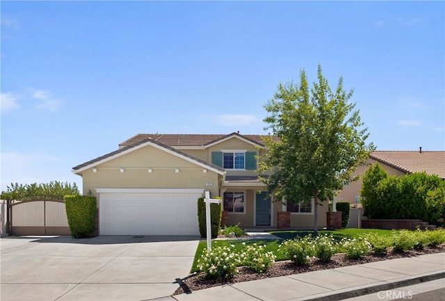 102 Mesa Ct, Calimesa, CA 92320 - view of front of property with concrete driveway, a gate, stucco siding, and an attached garage