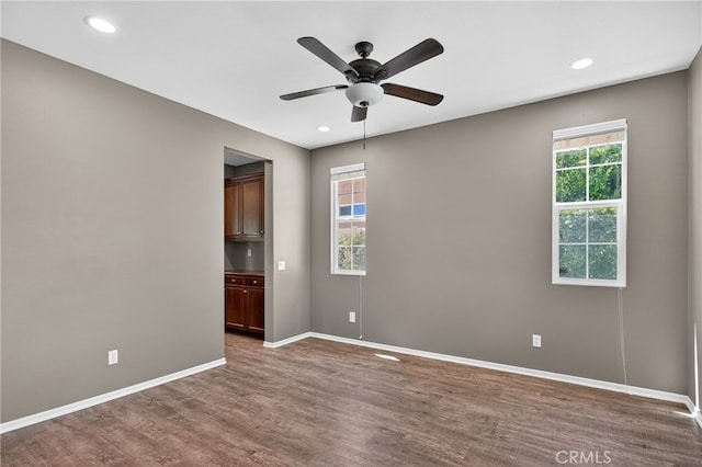 102 Mesa Ct, Calimesa, CA 92320 - unfurnished room with ceiling fan, dark wood-style flooring, and recessed lighting