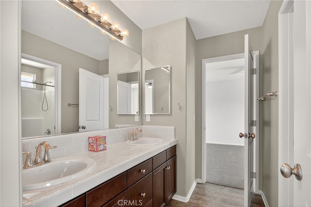 102 Mesa Ct, Calimesa, CA 92320 - full bath with double vanity, wood finished floors, and a tile shower