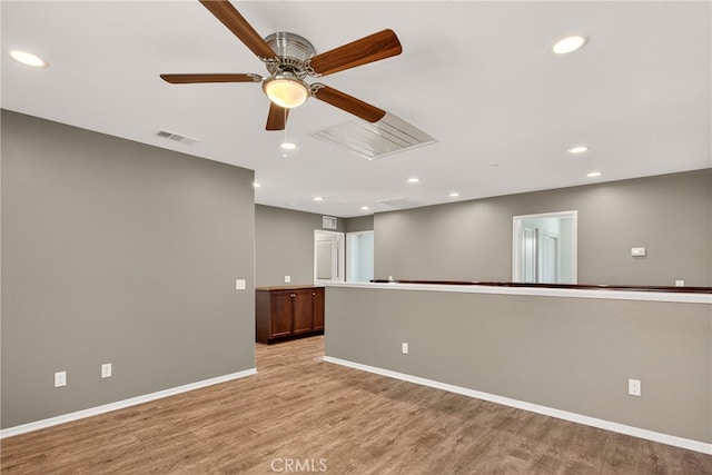 102 Mesa Ct, Calimesa, CA 92320 - empty room with light wood finished floors, ceiling fan, and recessed lighting