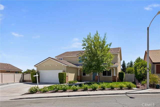 102 Mesa Ct, Calimesa, CA 92320 - obstructed view of property with a garage, driveway, and stucco siding