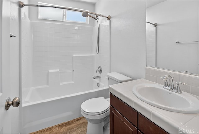 102 Mesa Ct, Calimesa, CA 92320 - bathroom featuring vanity, shower / tub combination, decorative backsplash, and wood finished floors