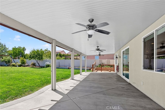 102 Mesa Ct, Calimesa, CA 92320 - fenced backyard featuring a patio and ceiling fan