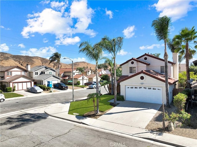 11700 White Pine Ct, Fontana, CA 92337 - view of asphalt street featuring a residential view, sidewalks, street lighting, and curbs