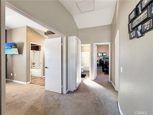 11700 White Pine Ct, Fontana, CA 92337 - corridor with carpet and lofted ceiling
