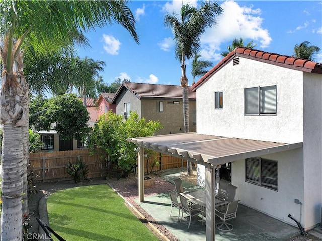 11700 White Pine Ct, Fontana, CA 92337 - fenced backyard with a patio area