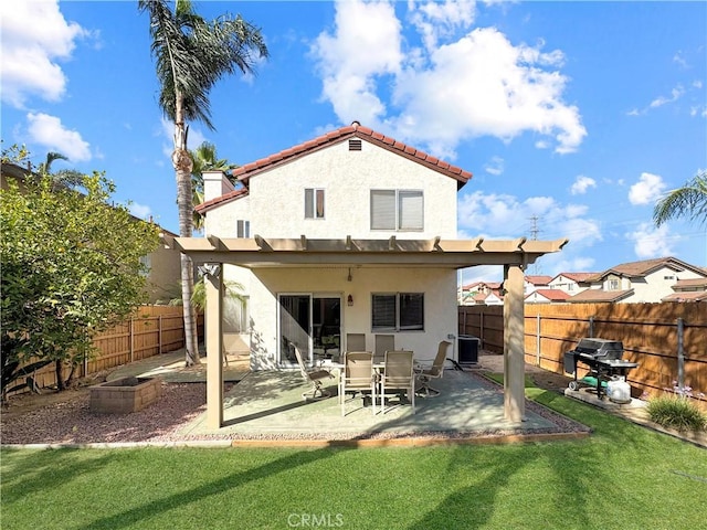 11700 White Pine Ct, Fontana, CA 92337 - back of house featuring stucco siding, a fenced backyard, a patio, and a tile roof