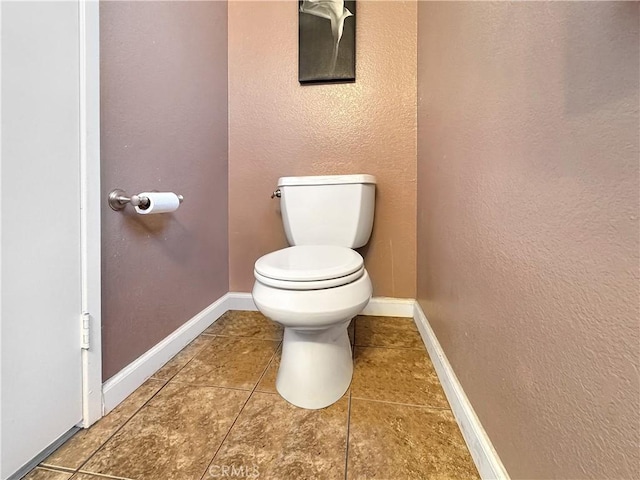 11700 White Pine Ct, Fontana, CA 92337 - bathroom featuring toilet and tile patterned flooring