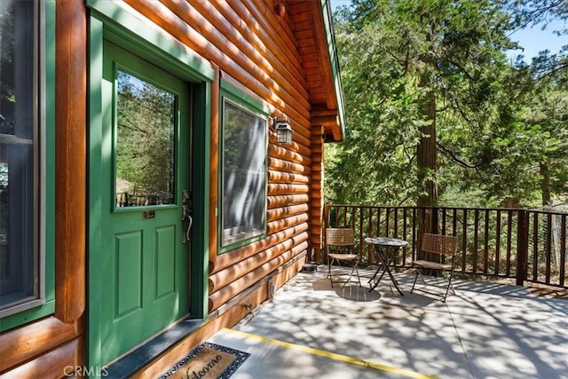 25148 Scenic View Dr, Crestline, CA 92325 - view of exterior entry with faux log siding