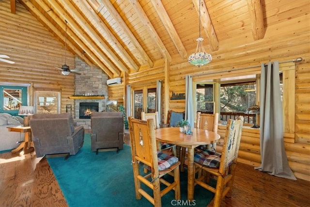 25148 Scenic View Dr, Crestline, CA 92325 - dining space with log walls, high vaulted ceiling, a ceiling fan, healthy amount of natural light, and a wooden ceiling with exposed beams
