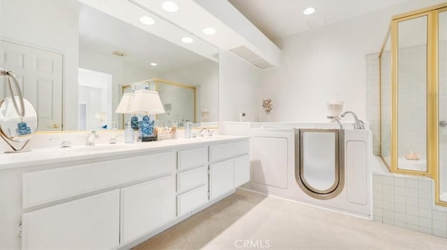 3620 Daffodil Ave Unit 31, Corona Del Mar, CA 92625 - bathroom with a shower stall, double vanity, recessed lighting, and a garden tub