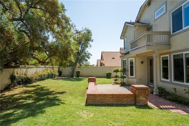 9320 Isaac Lord Dr, Rancho Cucamonga, CA 91701 - fenced backyard with a balcony and a patio area