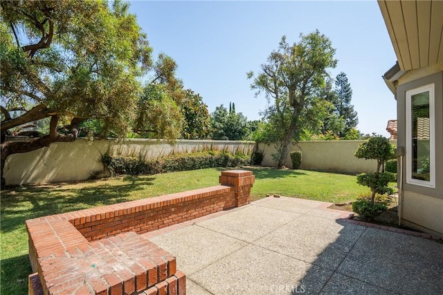 9320 Isaac Lord Dr, Rancho Cucamonga, CA 91701 - fenced backyard featuring a patio area