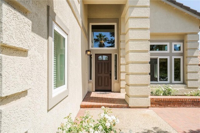 9320 Isaac Lord Dr, Rancho Cucamonga, CA 91701 - entrance to property with stucco siding