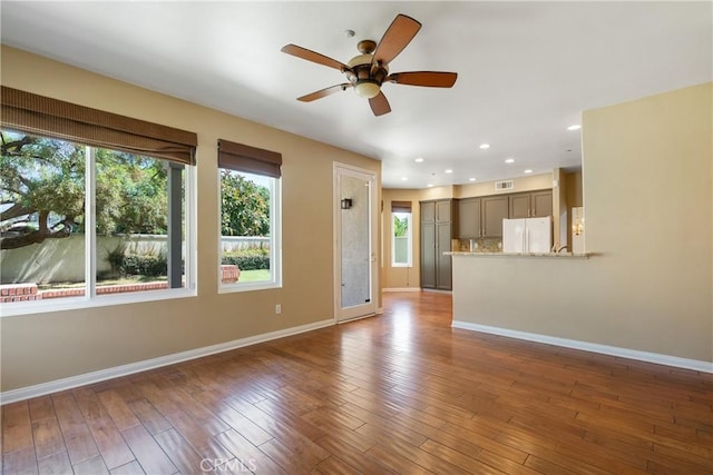 9320 Isaac Lord Dr, Rancho Cucamonga, CA 91701 - unfurnished living room with ceiling fan, wood finished floors, and recessed lighting