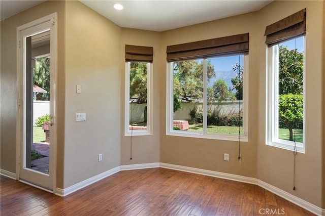 9320 Isaac Lord Dr, Rancho Cucamonga, CA 91701 - spare room with hardwood / wood-style floors, healthy amount of natural light, and recessed lighting