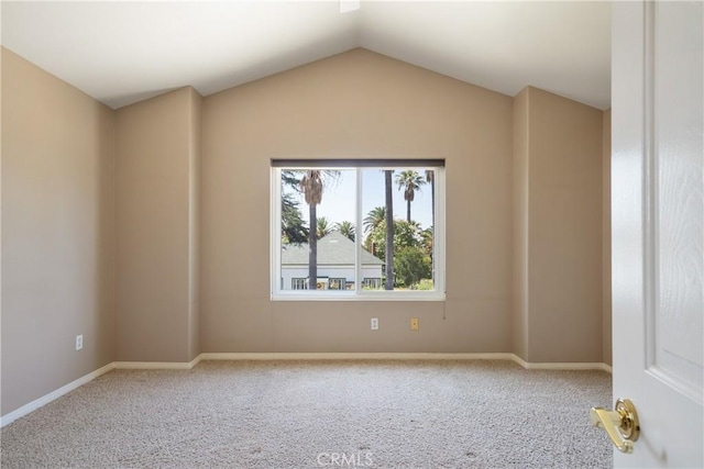 9320 Isaac Lord Dr, Rancho Cucamonga, CA 91701 - carpeted spare room featuring vaulted ceiling and baseboards
